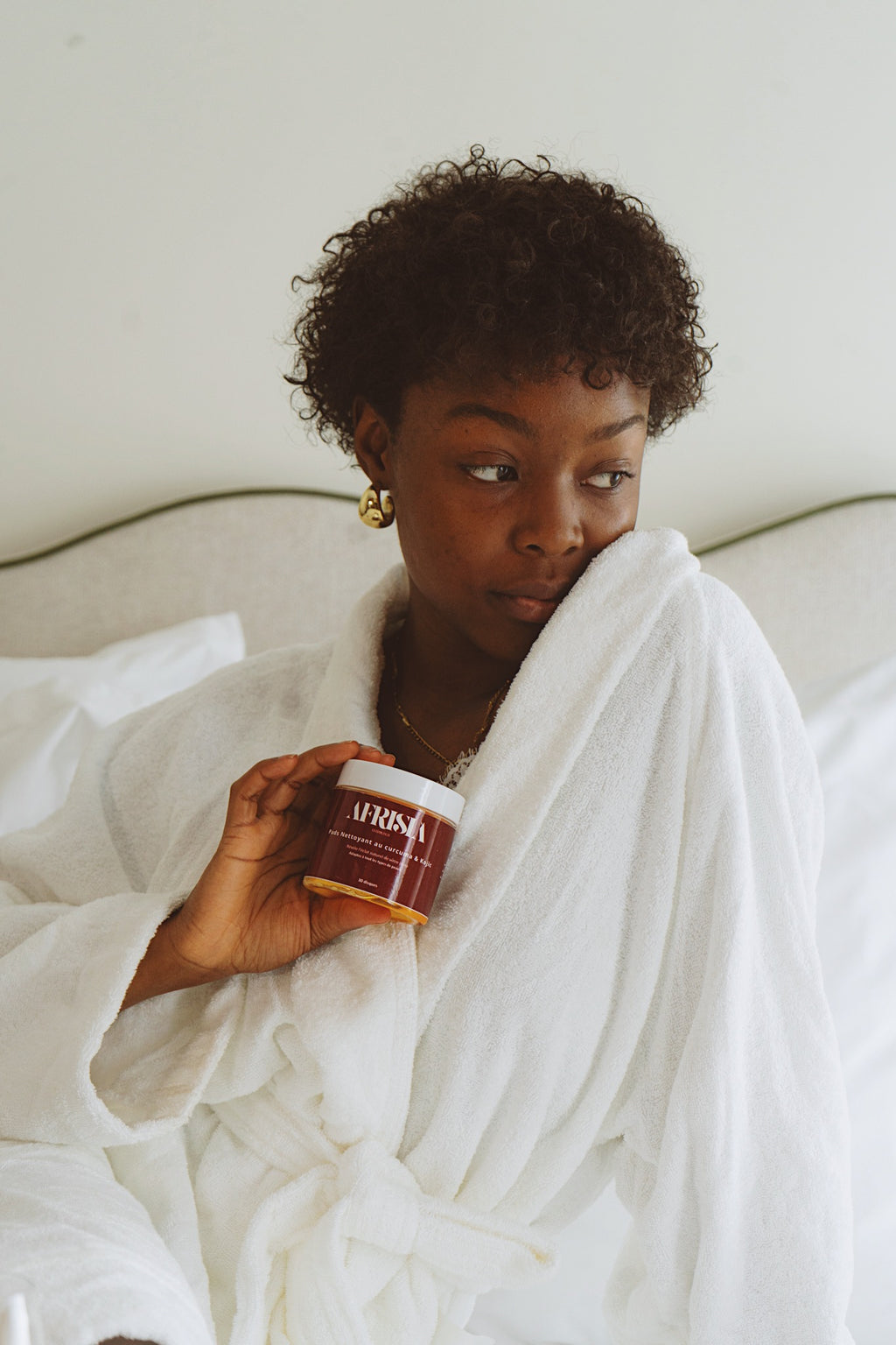 Cleansing pads with turmeric and kojic acid